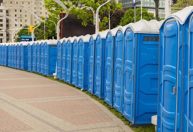 a row of portable restrooms ready for eventgoers in Aragon